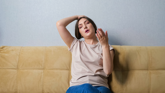 woman feeling hot at home